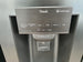 LG French Door 570 L Fridge Freezer in a Matte Black finish, featuring an integrated ice and water dispenser Cheap World Online
