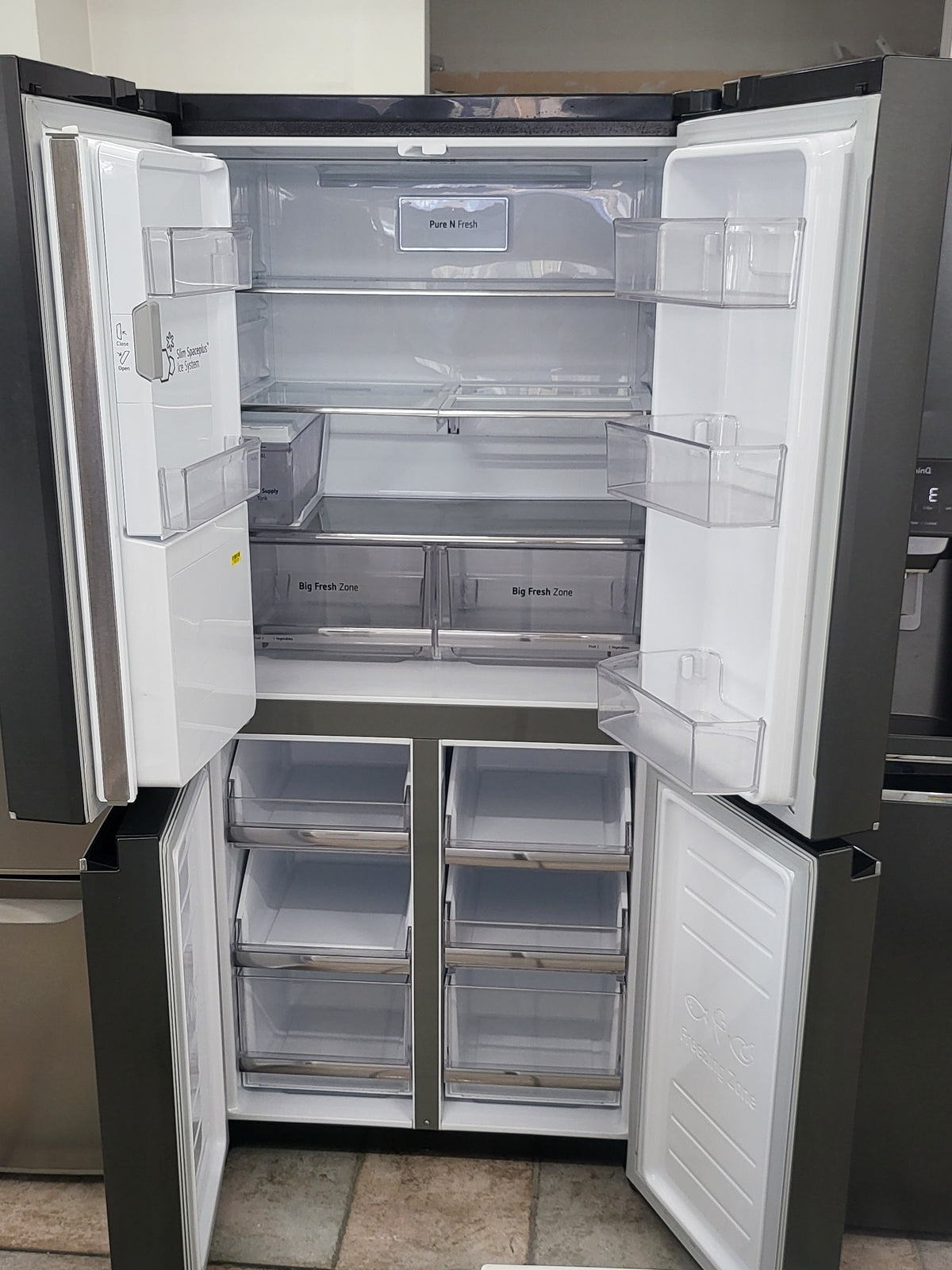 LG French Door 570L Fridge Freezer in a Matte Black finish, featuring an integrated ice and water dispenser Cheap World Online