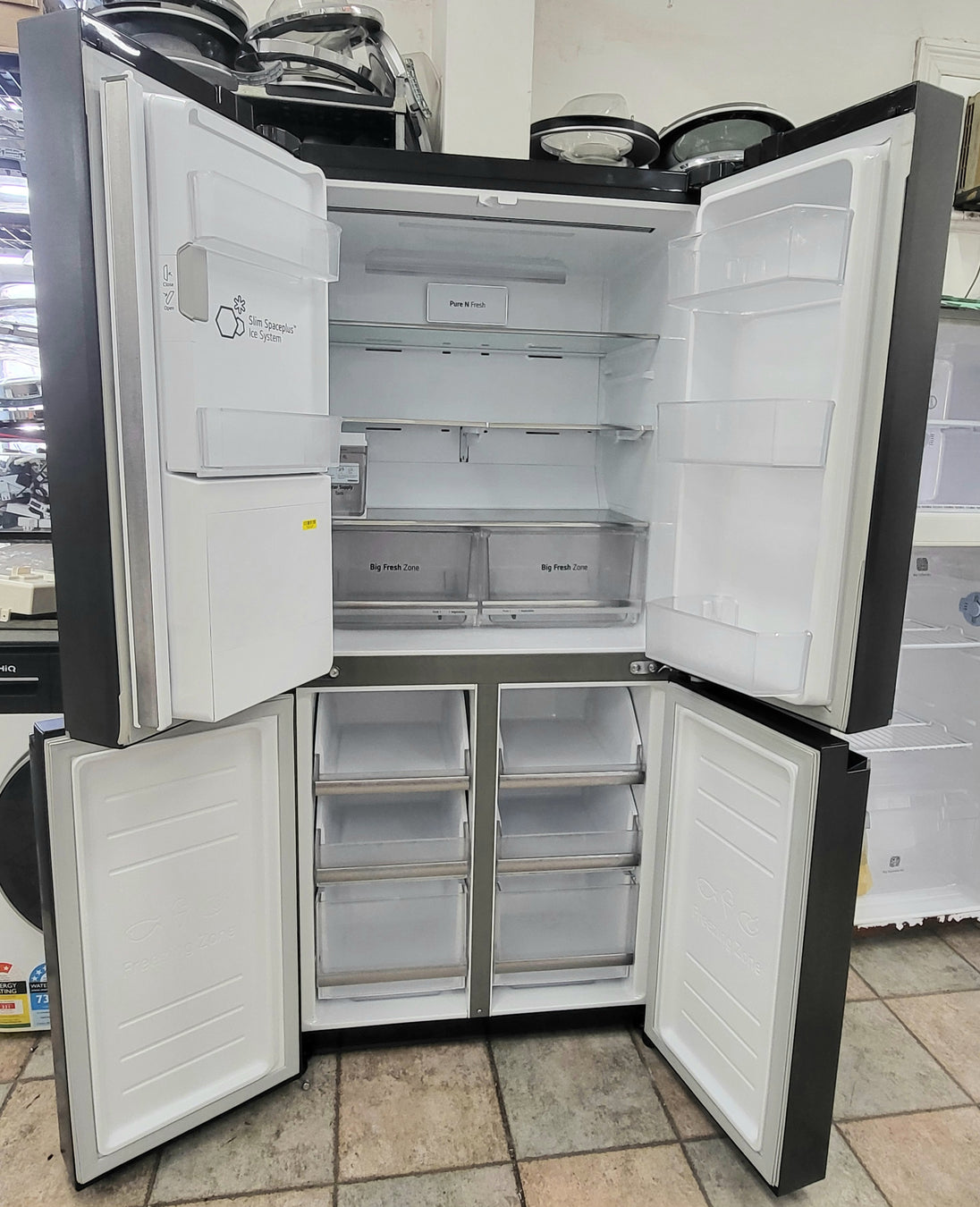 LG French Door 570L Fridge Freezer in a Matte Black finish, featuring an integrated Cheap World Online