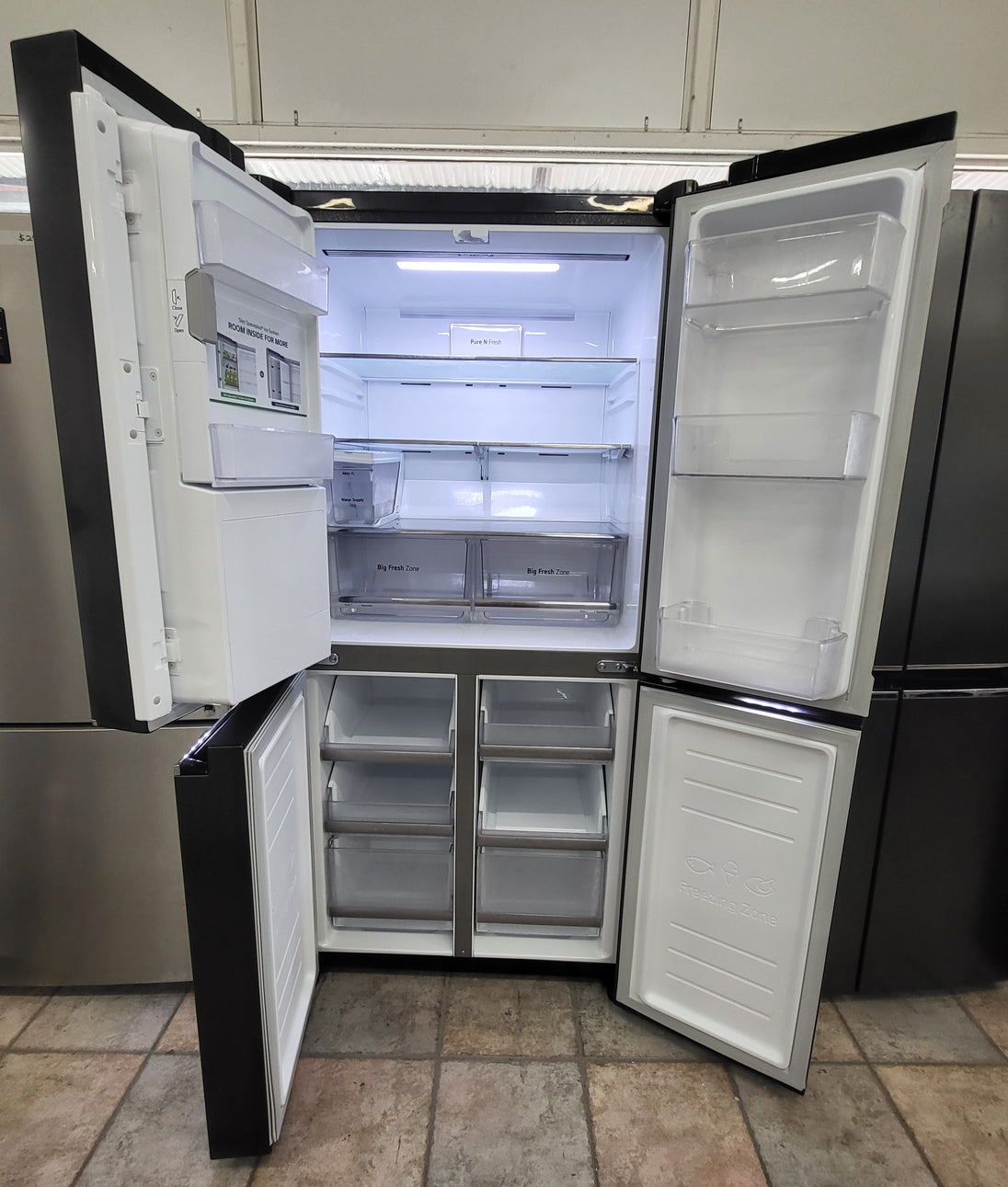 LG French Door 570L Fridge Freezer in a Matte Black finish, featuring an integrated Cheap World Online