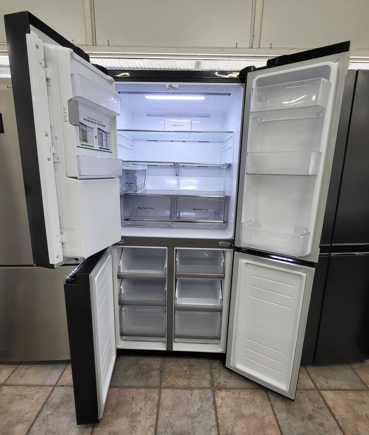 LG French Door 570L Fridge Freezer in a Matte Black finish, featuring an integrated Cheap World Online